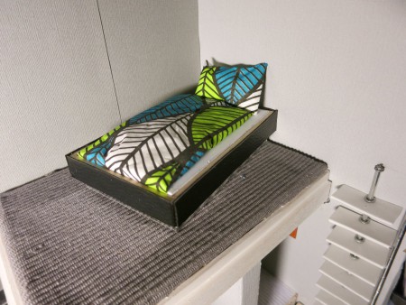 Nybyggd och nybädda. Påslakan av en servett.